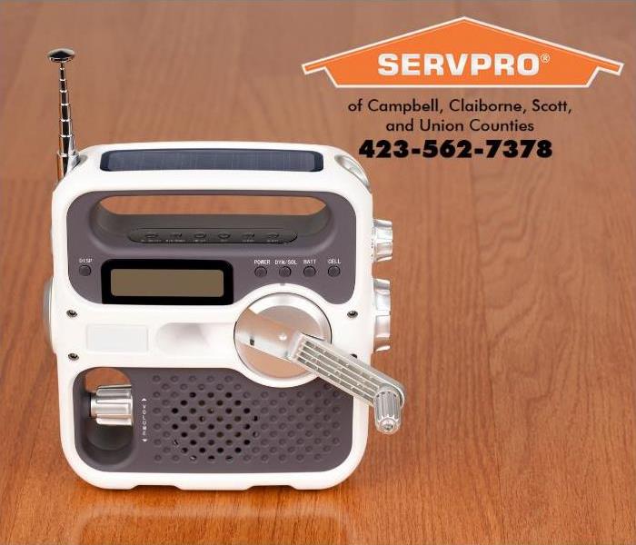 An emergency weather radio is shown. 